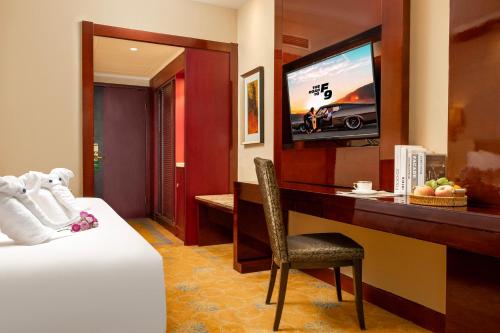 Imagen de la habitación del Hotel New Jiuzhai. Foto 19