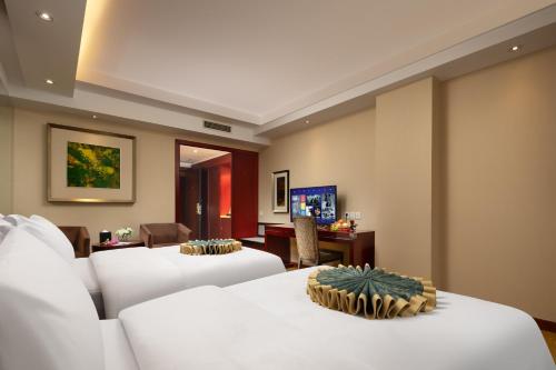 Imagen de la habitación del Hotel New Jiuzhai. Foto 20