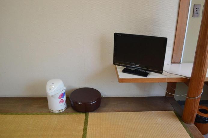 Imagen de la habitación del Hotel New Kankai Honkan Tenku Hotel Kairo. Foto 13