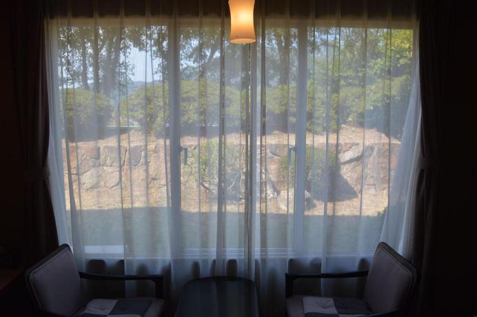 Imagen de la habitación del Hotel New Kankai Honkan Tenku Hotel Kairo. Foto 17