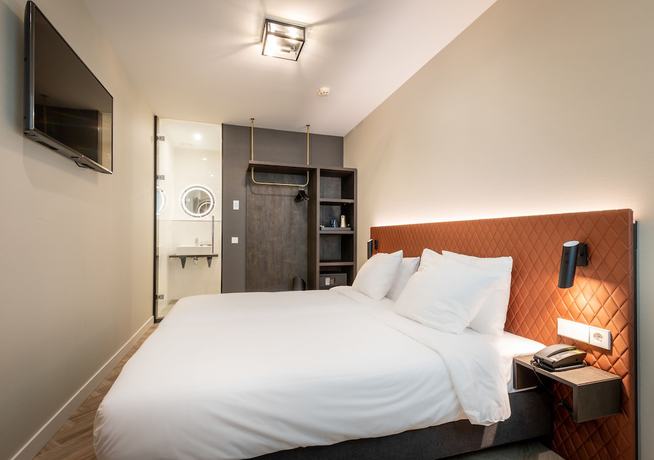 Imagen de la habitación del Hotel New Kit. Foto 10