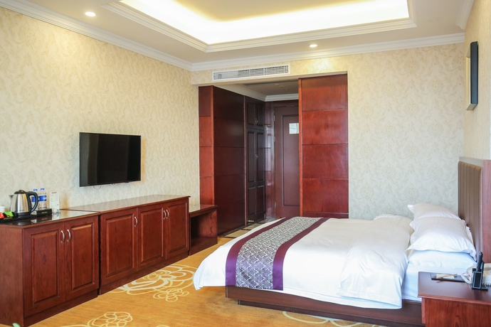 Imagen de la habitación del Hotel New Knight Royal. Foto 7