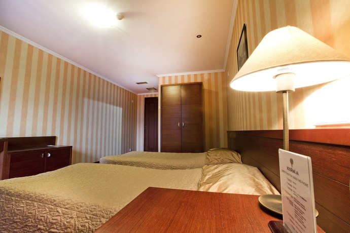 Imagen de la habitación del Hotel New Kopala. Foto 6
