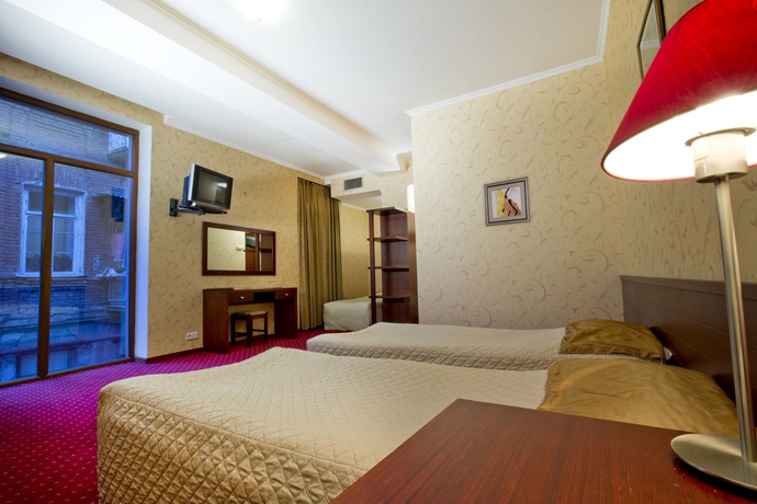 Imagen de la habitación del Hotel New Kopala. Foto 9