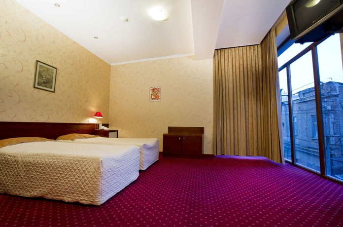 Imagen de la habitación del Hotel New Kopala. Foto 11