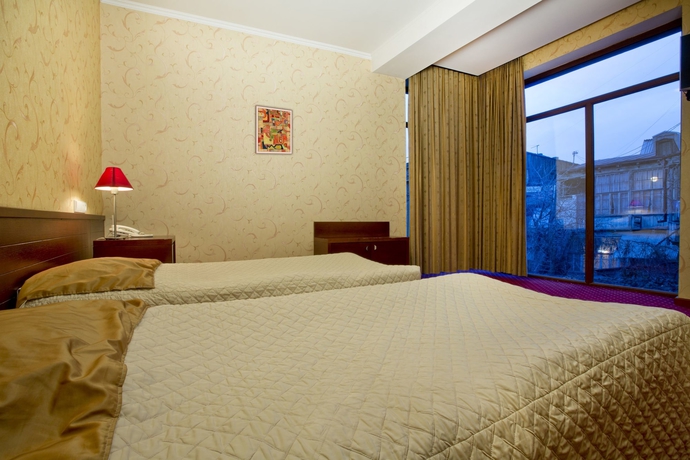 Imagen de la habitación del Hotel New Kopala. Foto 12