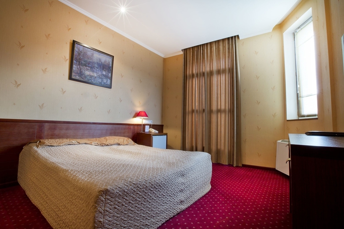 Imagen de la habitación del Hotel New Kopala. Foto 13