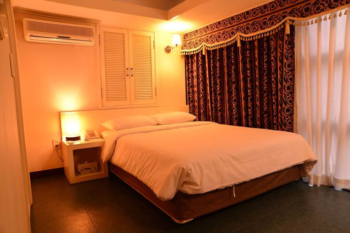 Imagen de la habitación del Hotel New Korea. Foto 2