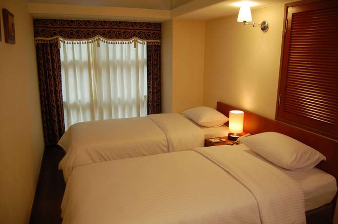Imagen de la habitación del Hotel New Korea. Foto 4