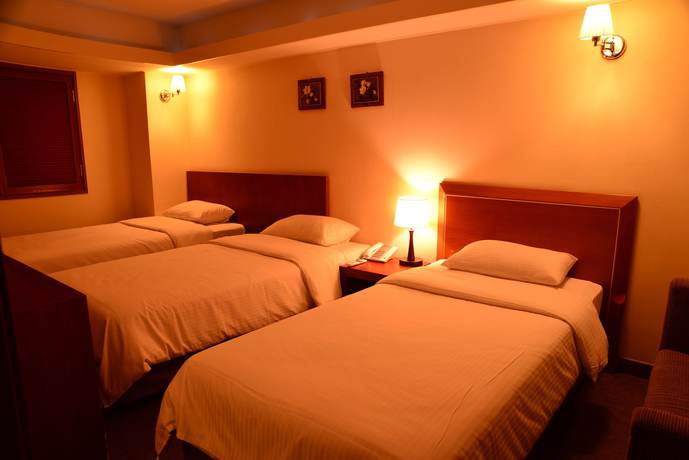 Imagen de la habitación del Hotel New Korea. Foto 9