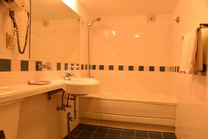 Imagen de la habitación del Hotel New Korea. Foto 11