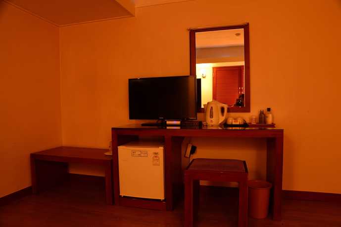 Imagen de la habitación del Hotel New Korea. Foto 12