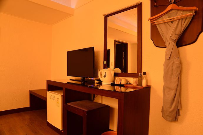Imagen de la habitación del Hotel New Korea. Foto 13