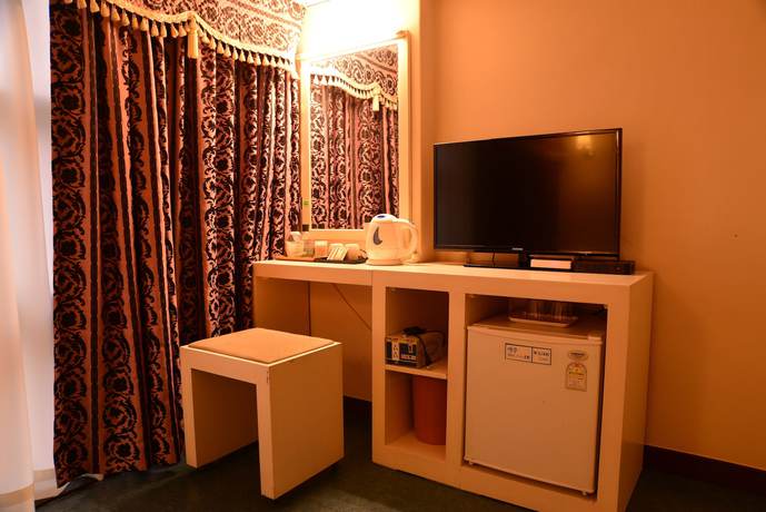 Imagen de la habitación del Hotel New Korea. Foto 18