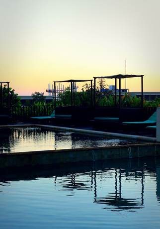 Imagen de la piscina del Hotel New Kuta. Foto 11