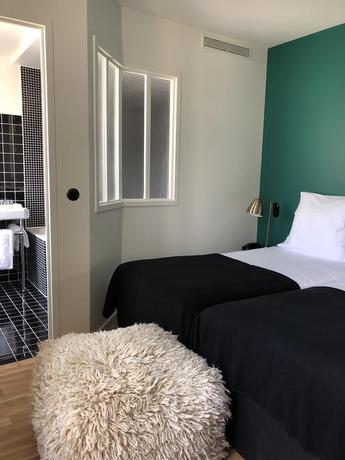 Imagen de la habitación del Hotel New Le Voltaire. Foto 6