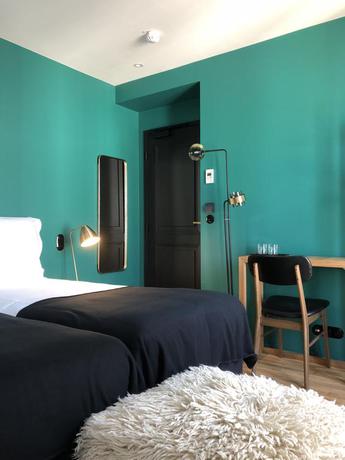 Imagen de la habitación del Hotel New Le Voltaire. Foto 7