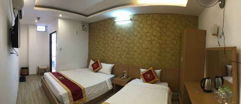 Imagen de la habitación del Hotel New Legend. Foto 17