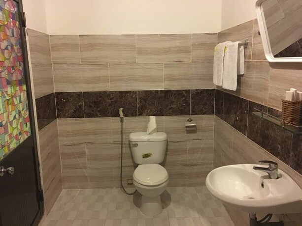 Imagen de la habitación del Hotel New Legend. Foto 19