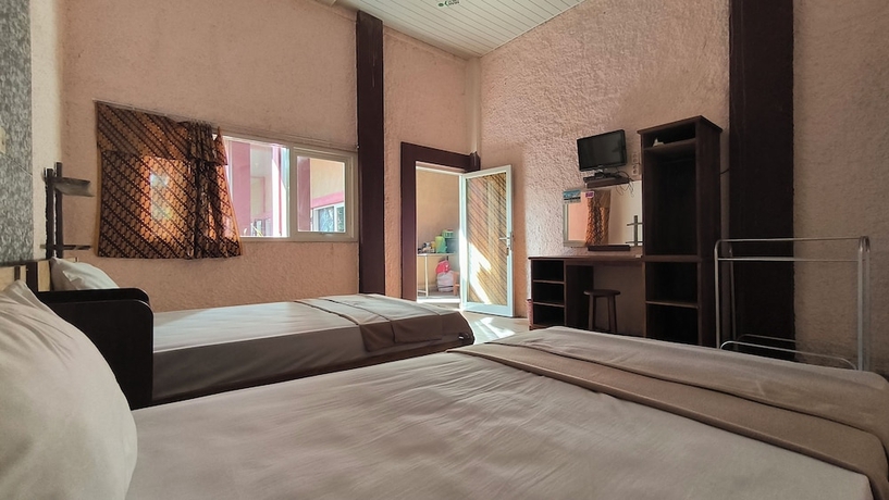 Imagen de la habitación del Hotel New Lishafa Guesthouse. Foto 10