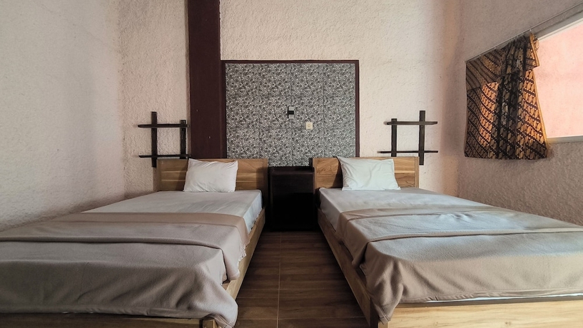 Imagen de la habitación del Hotel New Lishafa Guesthouse. Foto 13