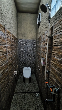 Imagen de la habitación del Hotel New Lishafa Guesthouse. Foto 14