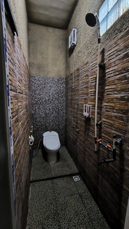 Imagen de la habitación del Hotel New Lishafa Guesthouse. Foto 15
