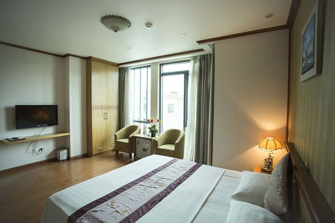 Imagen de la habitación del Hotel New Lotus. Foto 20