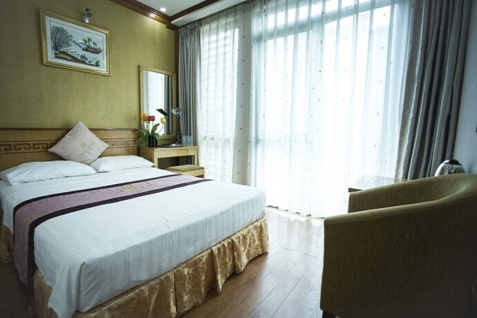 Imagen de la habitación del Hotel New Lotus. Foto 22