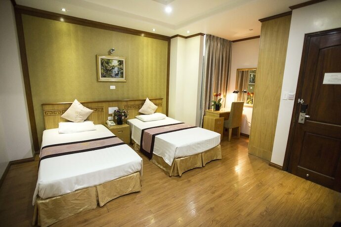 Imagen de la habitación del Hotel New Lotus. Foto 27