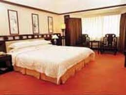 Imagen de la habitación del Hotel New Mainland. Foto 4