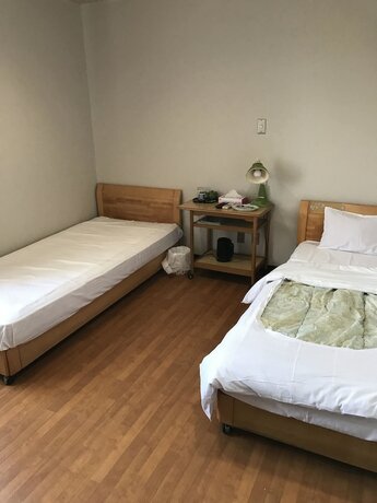 Imagen de la habitación del Hotel New Makomo. Foto 20