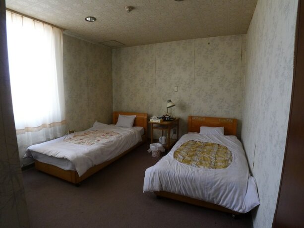 Imagen de la habitación del Hotel New Makomo. Foto 22