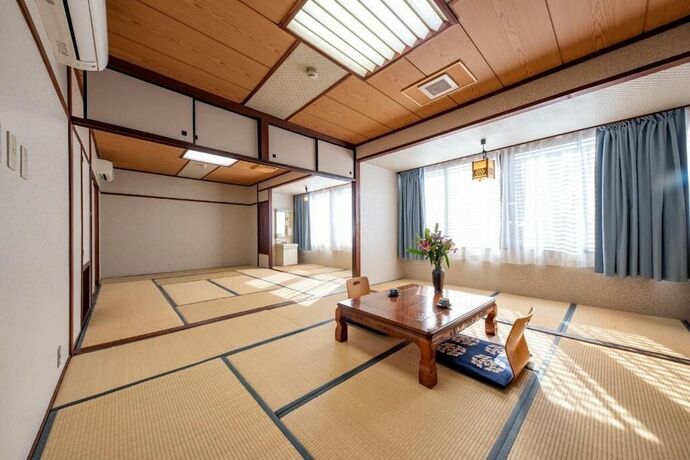 Imagen de la habitación del Hotel New Makomo. Foto 26