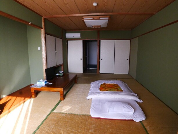 Imagen de la habitación del Hotel New Makomo. Foto 33
