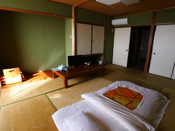 Imagen de la habitación del Hotel New Makomo. Foto 37