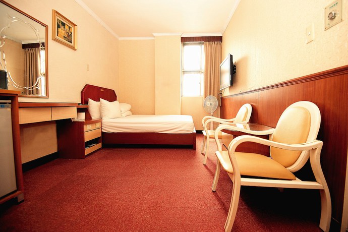 Imagen de la habitación del Hotel New May Flower. Foto 5