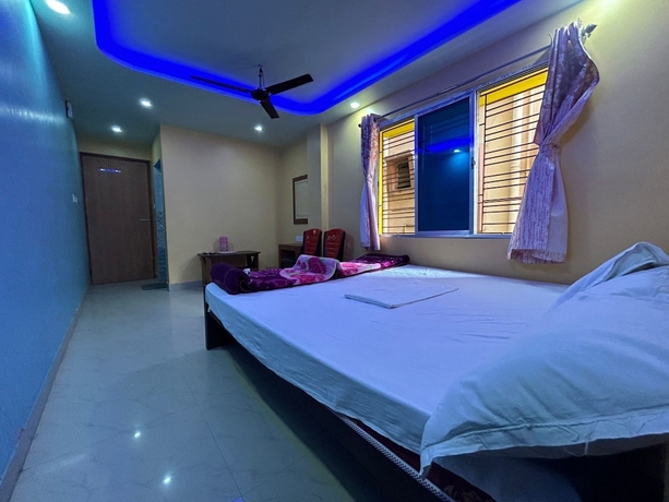 Imagen de la habitación del Hotel New Nayantara Lodge. Foto 4