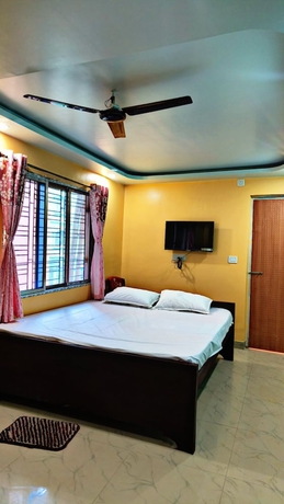 Imagen de la habitación del Hotel New Nayantara Lodge. Foto 14