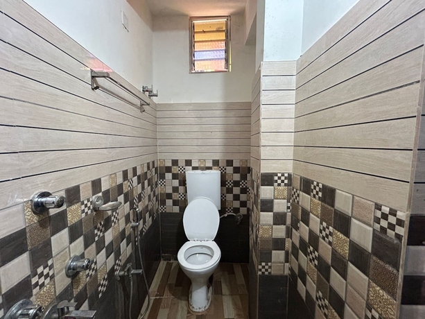 Imagen de la habitación del Hotel New Nayantara Lodge. Foto 16