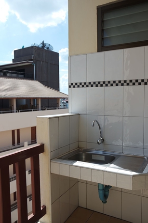 Imagen de la habitación del Hotel New Nikom Court. Foto 9