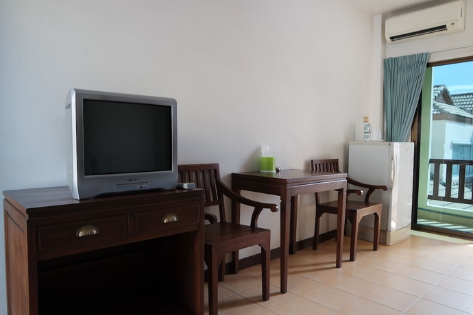 Imagen de la habitación del Hotel New Nikom Court. Foto 10
