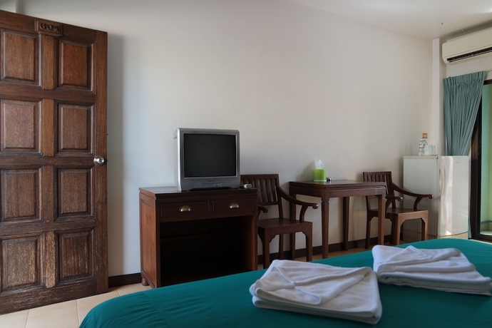 Imagen de la habitación del Hotel New Nikom Court. Foto 11