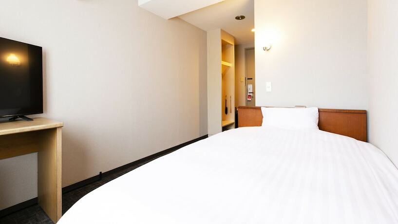 Imagen de la habitación del Hotel New Nishino. Foto 15