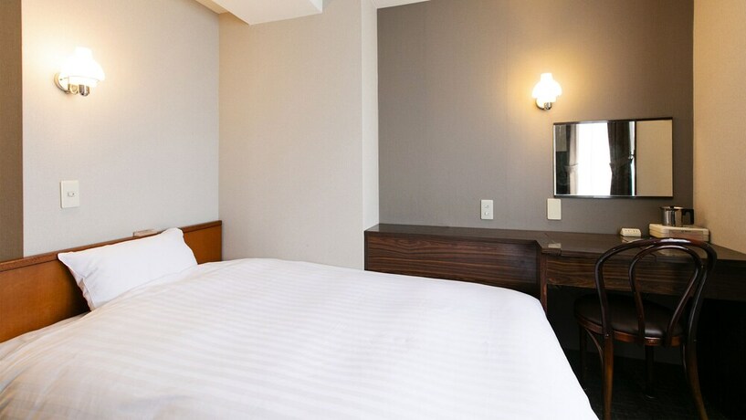 Imagen de la habitación del Hotel New Nishino. Foto 24