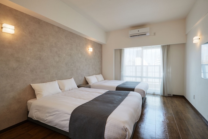 Imagen de la habitación del Hotel New Normal Hotel in NAMINOUE. Foto 2