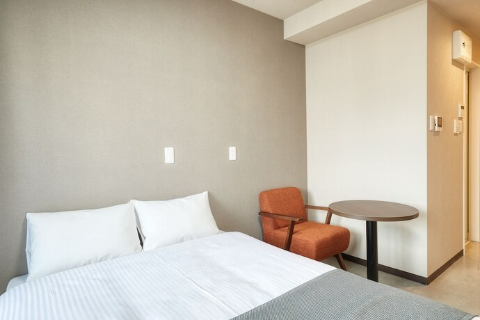 Imagen de la habitación del Hotel New Normal in MATSUYAMA. Foto 14