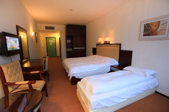 Imagen de la habitación del Hotel New Ocean Paradise. Foto 6