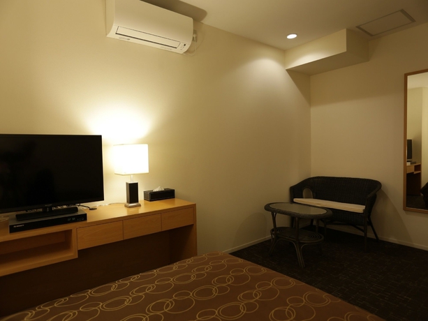 Imagen de la habitación del Hotel New Okinawa. Foto 11
