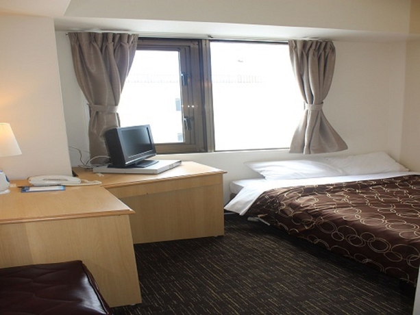 Imagen de la habitación del Hotel New Okinawa. Foto 13